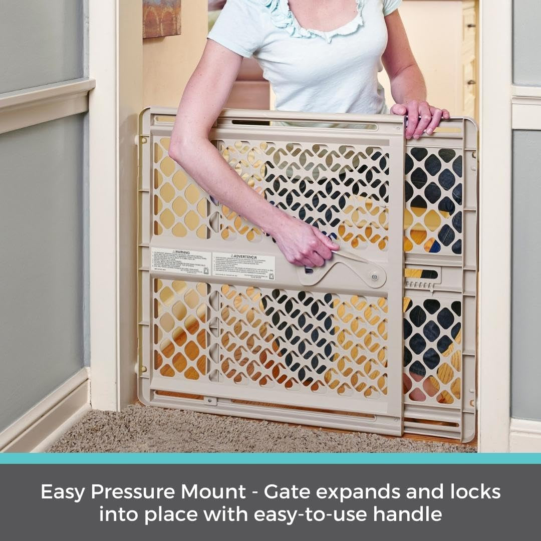 Toddleroo by North States Supergate Ergo Child Gate, Baby Gate for Stairs and Doorways. Includes Wall Cups. Pressure or Hardware Mount. Made in USA. (26" Tall, Sand)